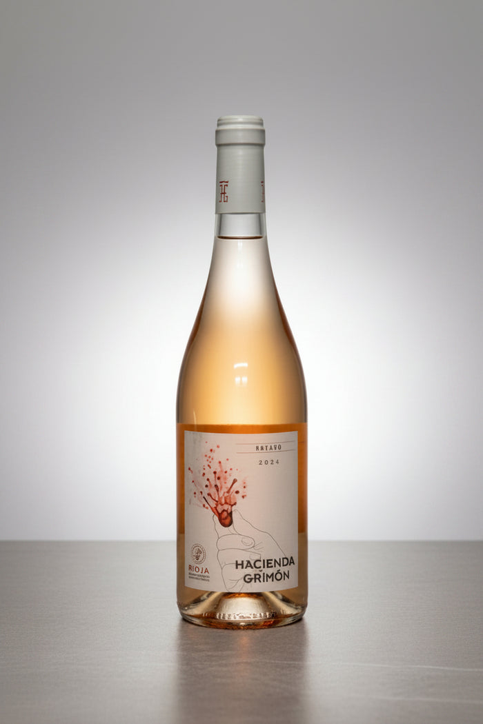 Bottle of Hacienda Grimon Rosado wine on a gray background