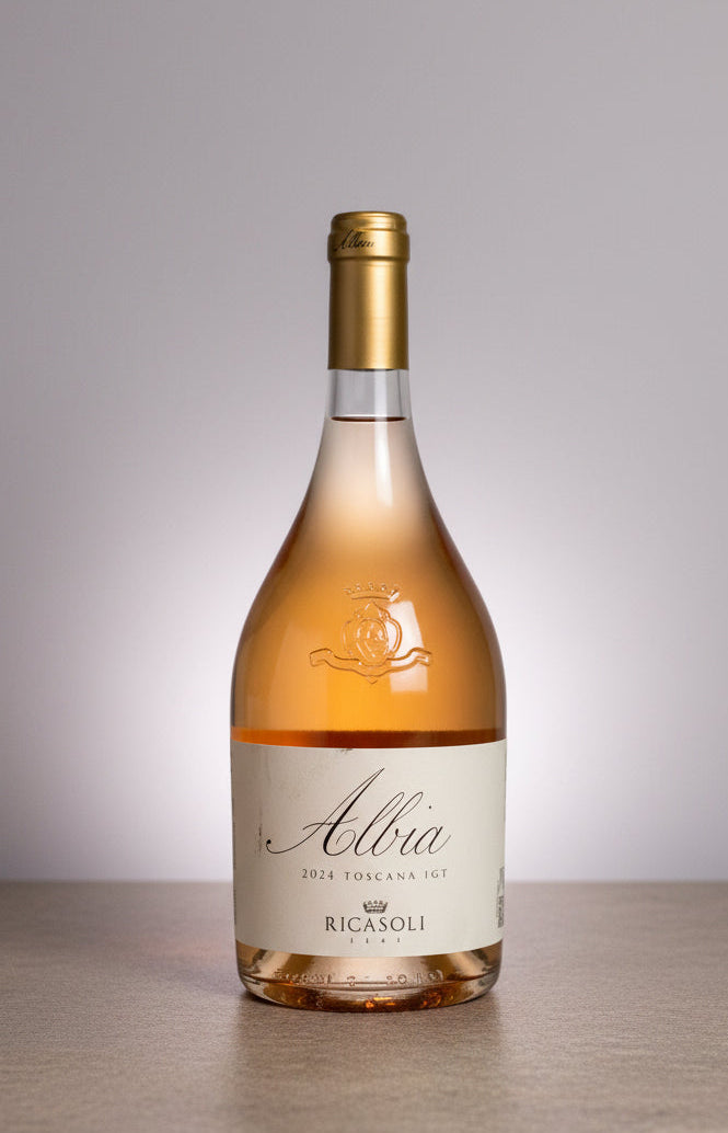 Wine bottle with 'Ricasoli' label on a white background